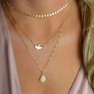 NWOT 3 layer teardrop dove necklace